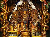 Tibet Lhasa 04 01 Potala Lokeshvara Sandalwood Statue The Potala�s most sacred statue is the small, ancient and jewel-encrusted gilded sandalwood image of Arya Lokeshvara, the personal tutelary deity (yidam) of Songtsen Gampo. Flanking it are Tara and Avalokiteshvara, both made of white sandalwood. This is one of the few corners of the Potala that dates from the time of Songtsen Gampo�s 7th century palace. Since photography isn't allowed in the Potala Palace, I highly recommend the book Splendor of Tibet: The Potala Palace, Jewel of the Himalayas by Phuntsok Namgyalis, from which this photo was taken.